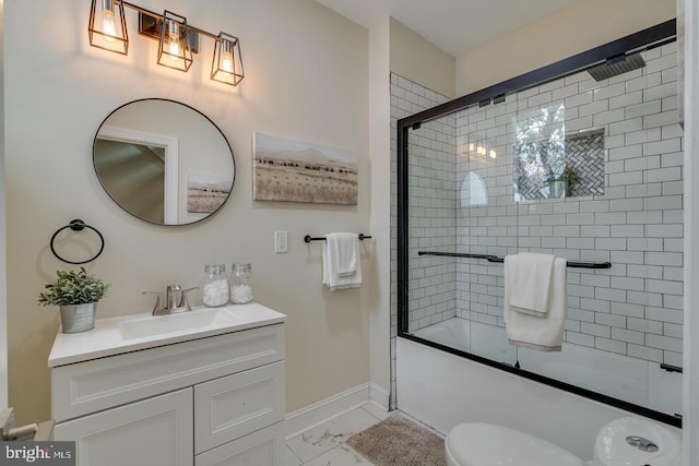 full bathroom with vanity, toilet, and combined bath / shower with glass door