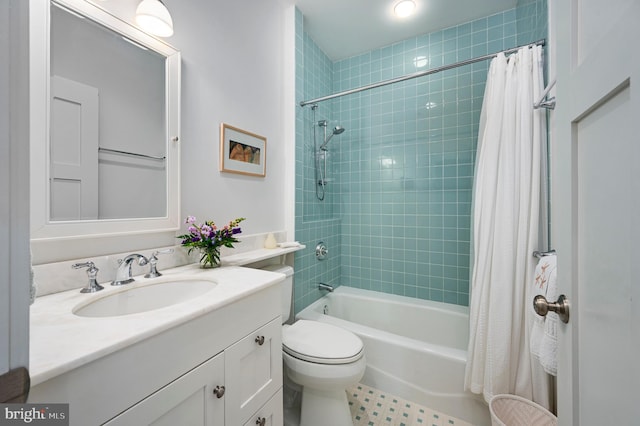 full bathroom featuring vanity, toilet, shower / bathtub combination with curtain, and tile patterned floors