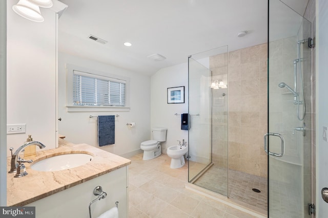 bathroom with vanity, a bidet, a shower with shower door, tile patterned floors, and toilet