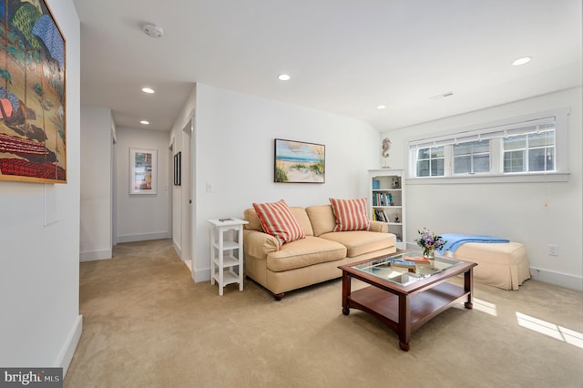 living room featuring light carpet