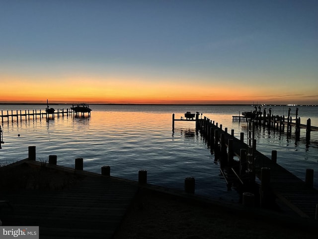 view of dock with a water view