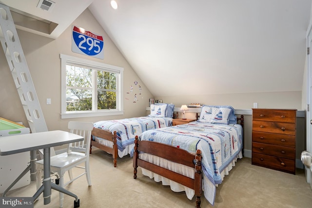 bedroom featuring lofted ceiling and light colored carpet