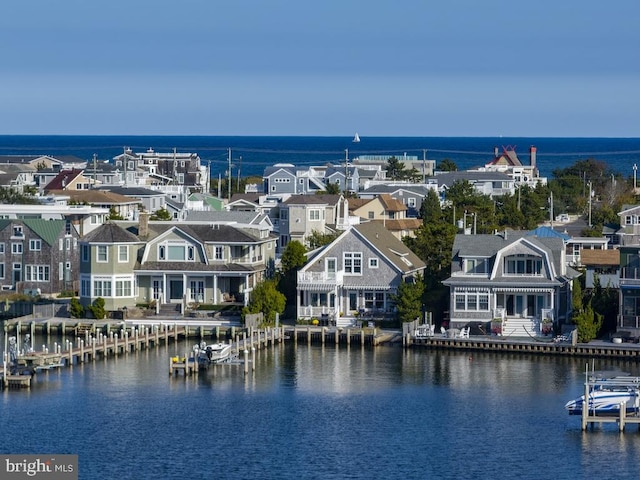 water view featuring a dock