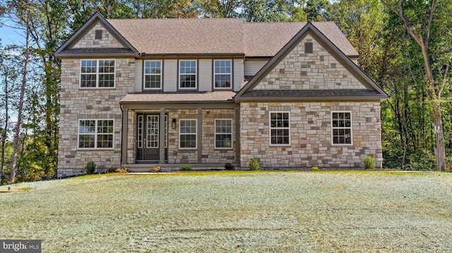 view of front facade featuring a front yard