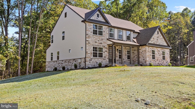 view of front of home featuring a front yard