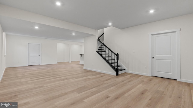 basement featuring light hardwood / wood-style flooring