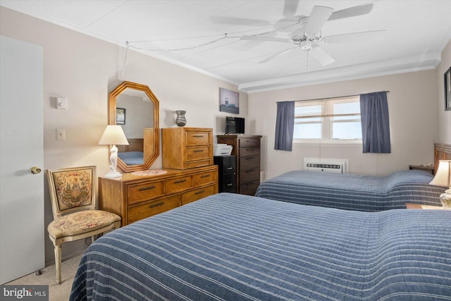 carpeted bedroom with crown molding, a wall mounted AC, and ceiling fan