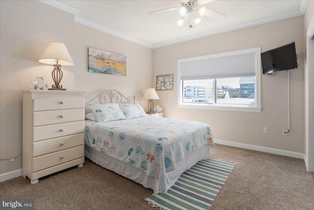 bedroom featuring ceiling fan, ornamental molding, and carpet