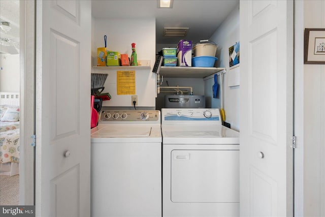 laundry area featuring independent washer and dryer