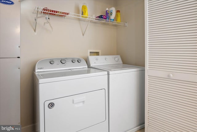 laundry area with washer and dryer