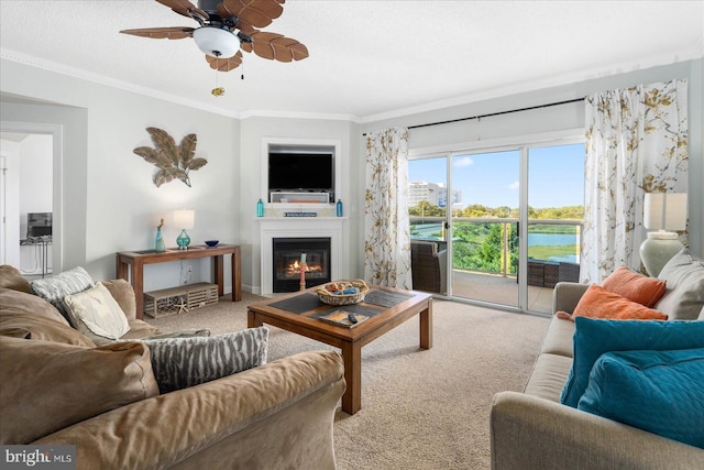 carpeted living room featuring a textured ceiling, ceiling fan, and crown molding