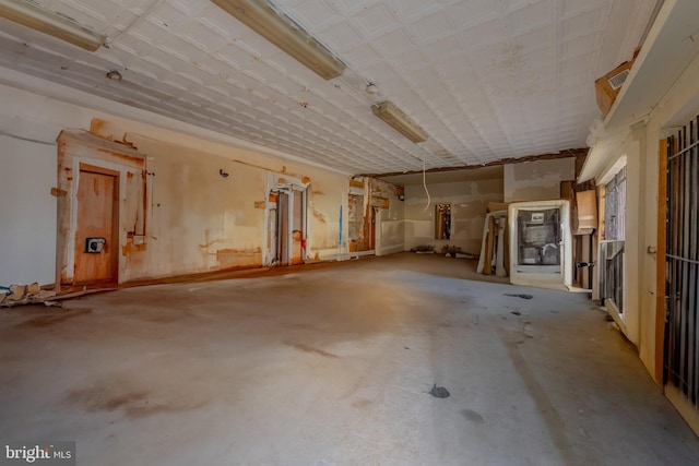 miscellaneous room with concrete flooring