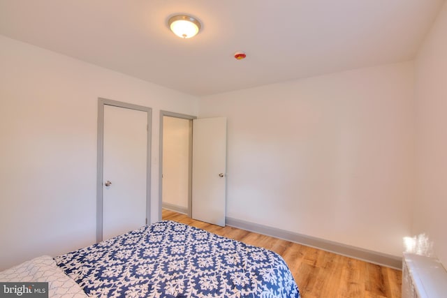 bedroom featuring light hardwood / wood-style flooring