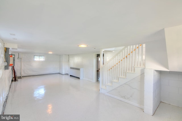 basement featuring radiator heating unit