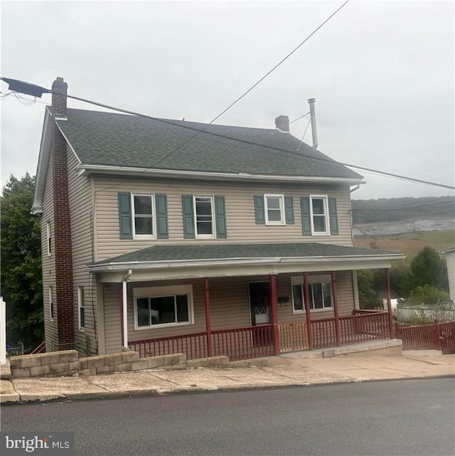 view of front of property featuring covered porch