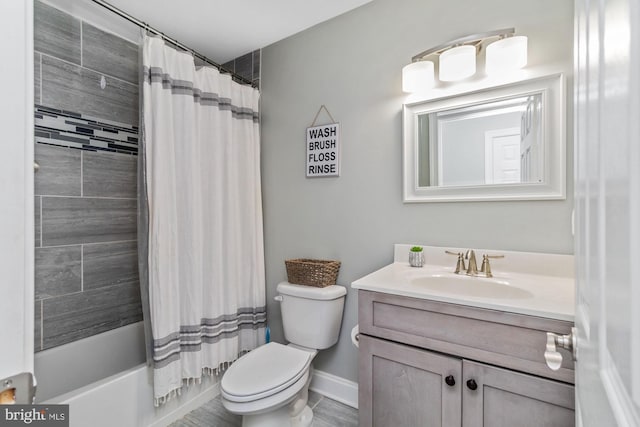 full bathroom featuring vanity, shower / bath combo, and toilet