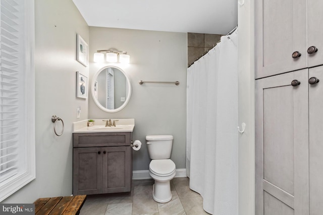 bathroom featuring vanity, curtained shower, toilet, and tile patterned flooring