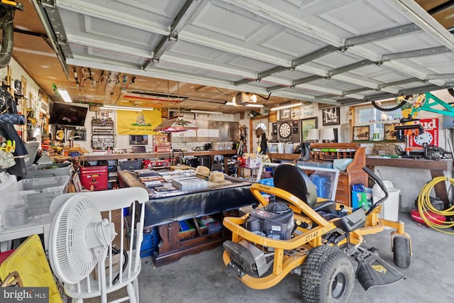 garage with a workshop area