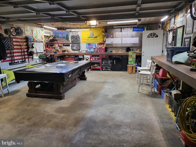 garage with a workshop area