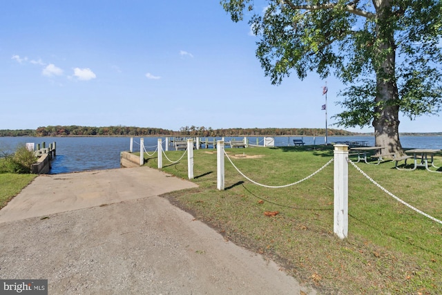 exterior space with a water view