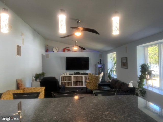 kitchen with lofted ceiling and ceiling fan