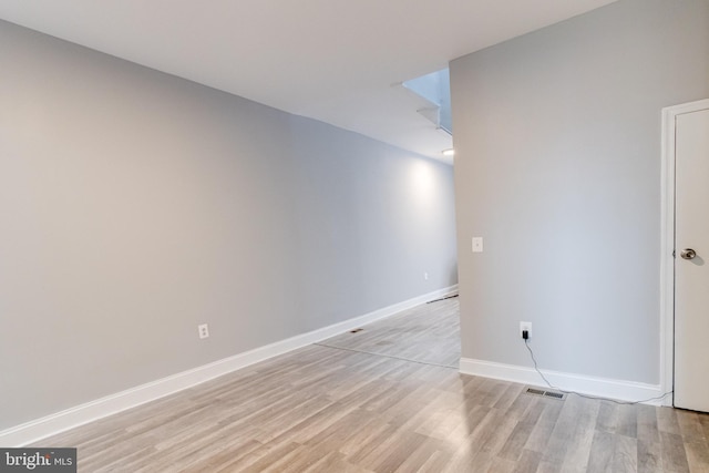 unfurnished room featuring light hardwood / wood-style floors