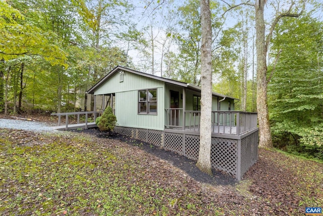 view of home's exterior with a deck