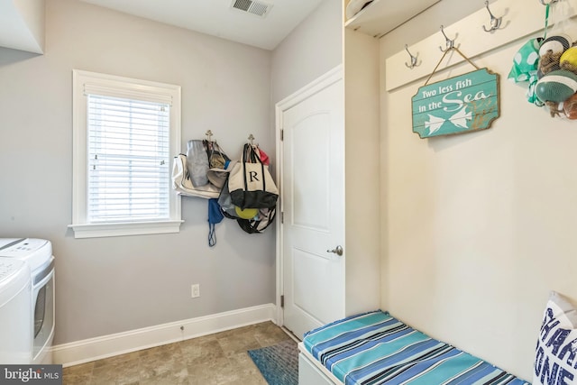 interior space with washer and clothes dryer