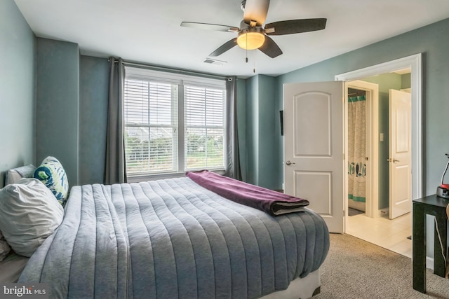 carpeted bedroom featuring ceiling fan