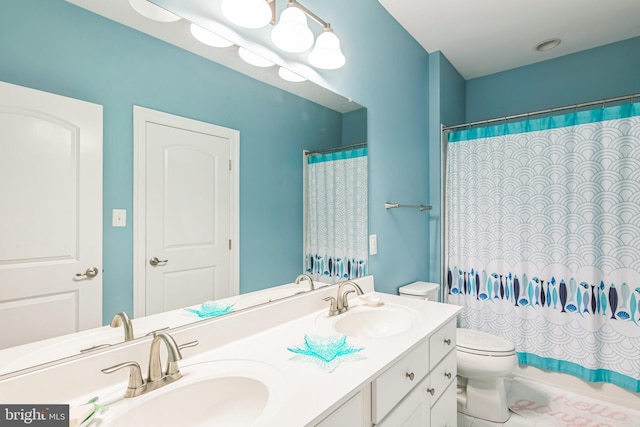 bathroom with tile patterned flooring, vanity, toilet, and a shower with shower curtain