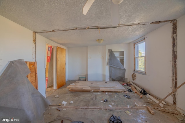 misc room with a textured ceiling