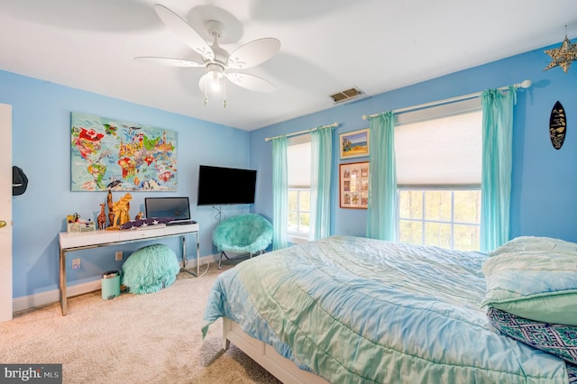 bedroom featuring ceiling fan and carpet floors