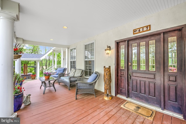 doorway to property with a porch