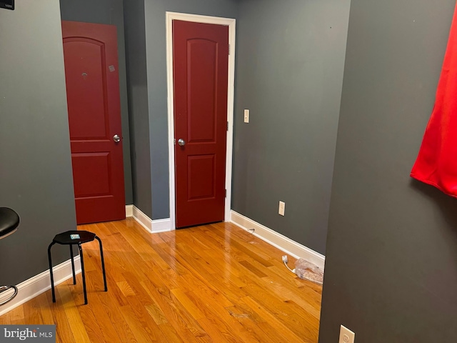 spare room with light hardwood / wood-style floors