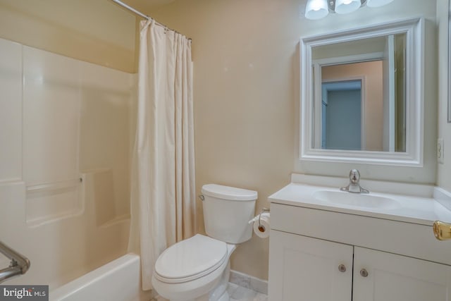 full bathroom with vanity, shower / bath combo, and toilet