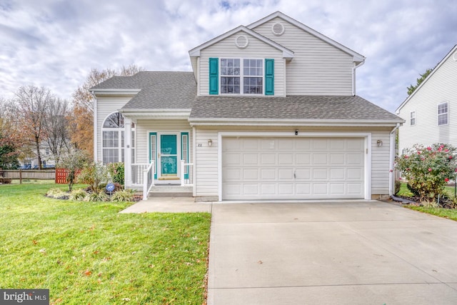 front facade with a garage and a front lawn