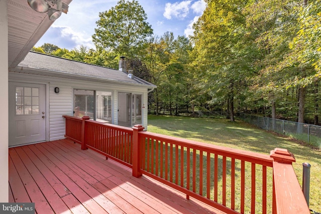 deck featuring a yard