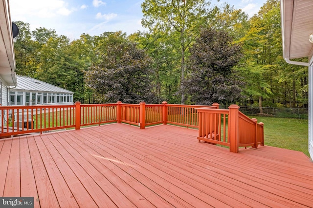 wooden deck with a yard