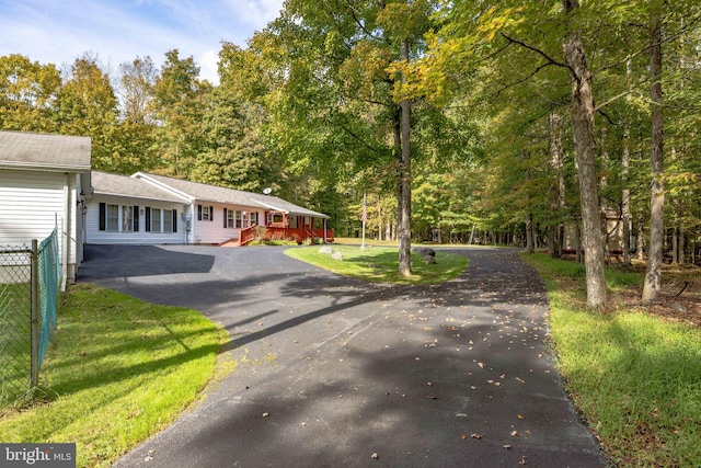 ranch-style house with a front yard