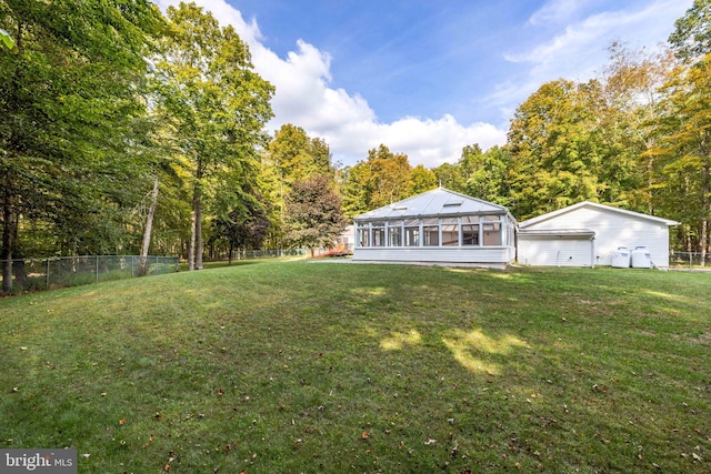 view of yard featuring a sunroom