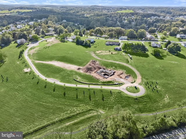 birds eye view of property featuring a rural view