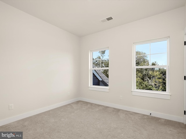 view of carpeted spare room