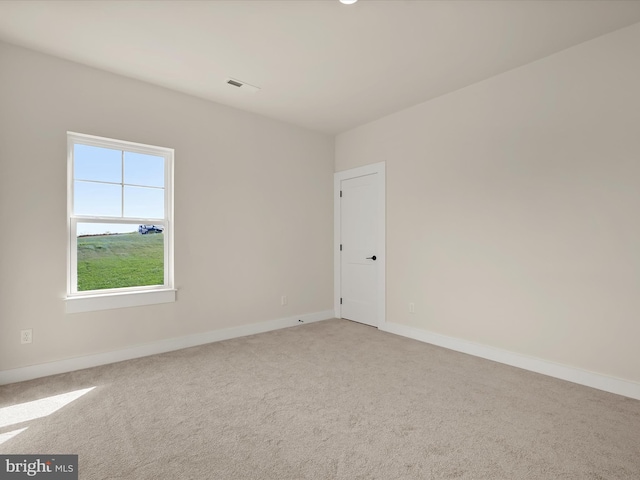 empty room featuring carpet flooring