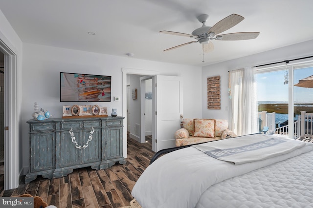 bedroom featuring dark wood-type flooring, ceiling fan, and access to exterior