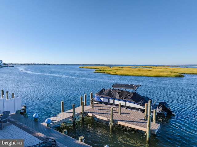 view of dock with a water view