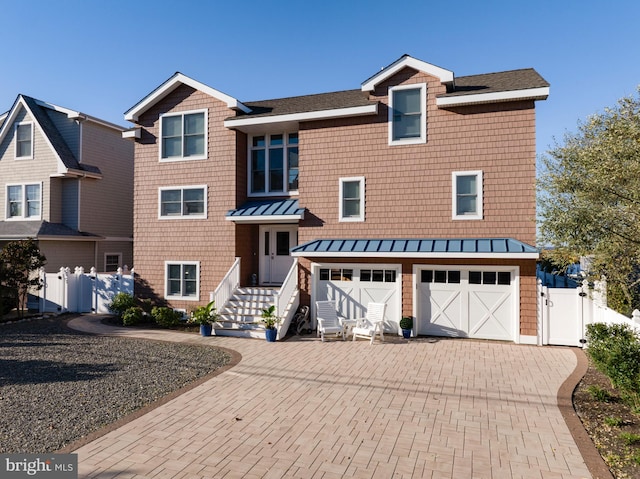 view of front of property featuring a garage