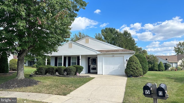 single story home with a front lawn and a garage