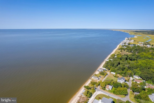 bird's eye view featuring a water view and a view of the beach