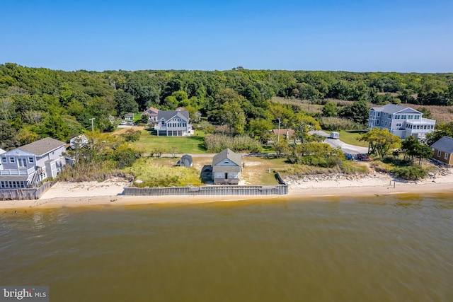 aerial view featuring a view of the beach and a water view