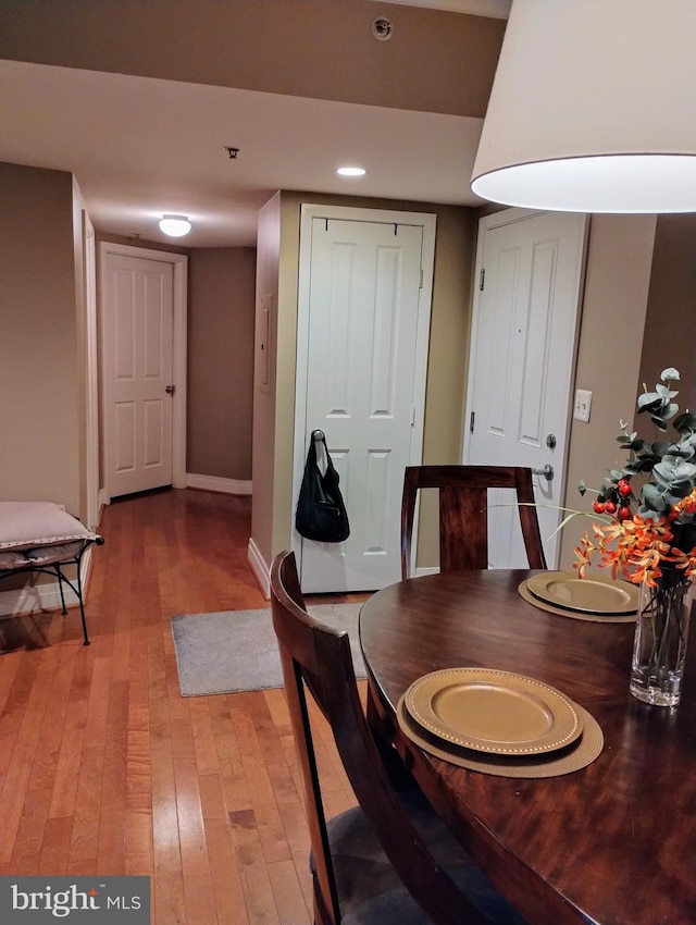 dining space featuring light wood-type flooring